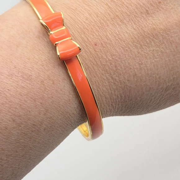 Kate Spade New York Skinny Mini Bow Enamel Bangle - Gold & Coral/Orange - Picture 11 of 14